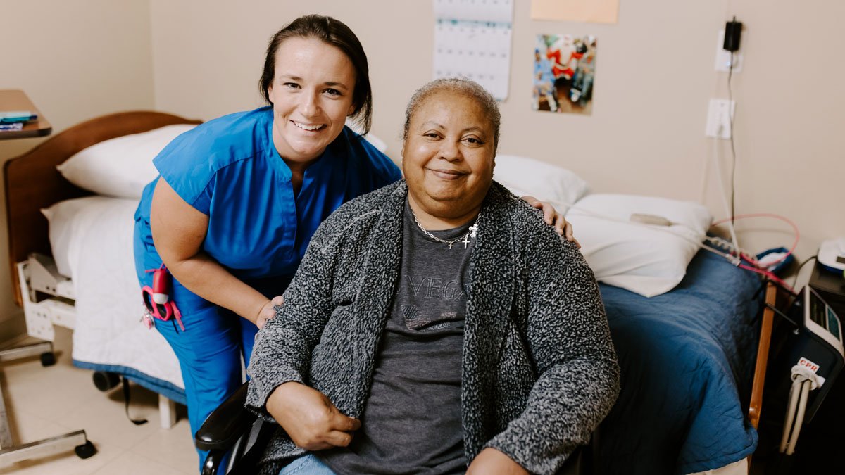 Staff Member with Elder at Encore Healthcare and Rehabilitation Center